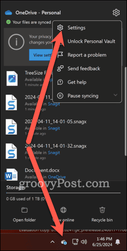 Right click OneDrive icon and choose settings